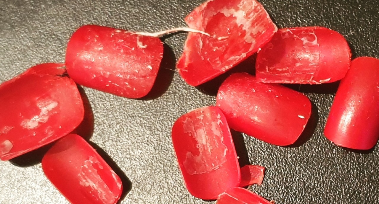 Red acrylic nails, removed after a night out
