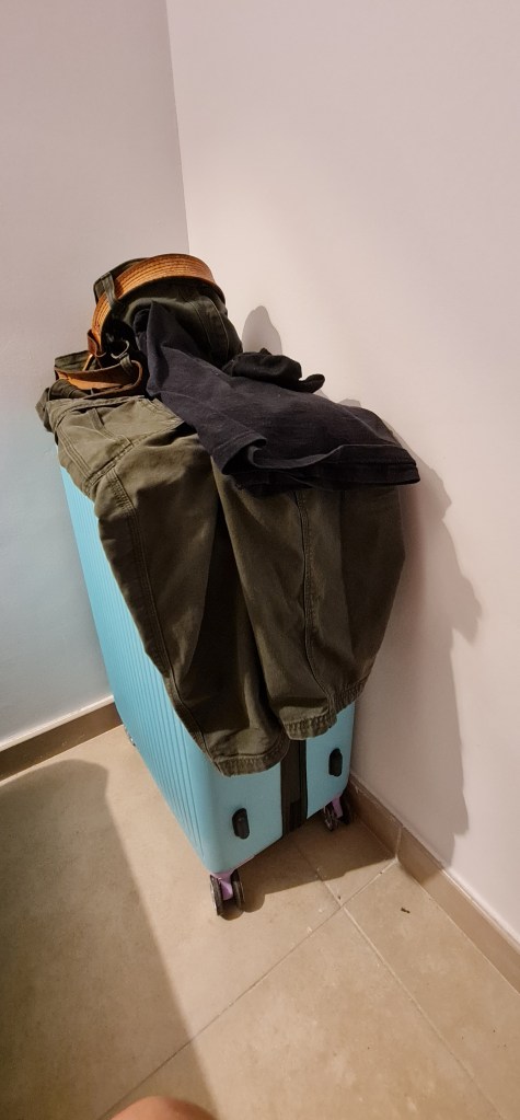 Pile of boy-clothes where they landed on Day 1