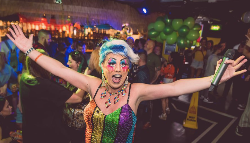 A happy diva. Presumably she hasn't had to cross her legs for hours to find a bathroom she feels safe enough to use!