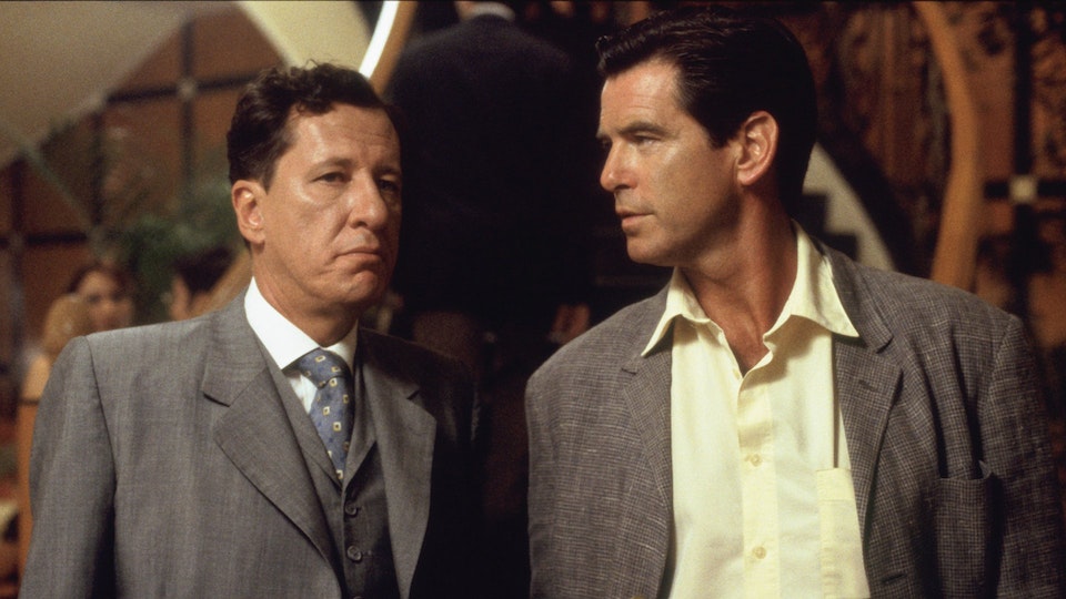 Image from the film The Tailor Of Panama, with Geoffry Rush as the Tailor and Pierce Brosnan as an MI6 agent.